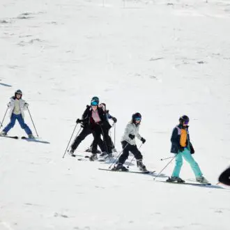 Monte Pora ski school group on trip