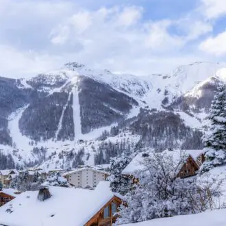 View on the snowy mountains of Auron, France
