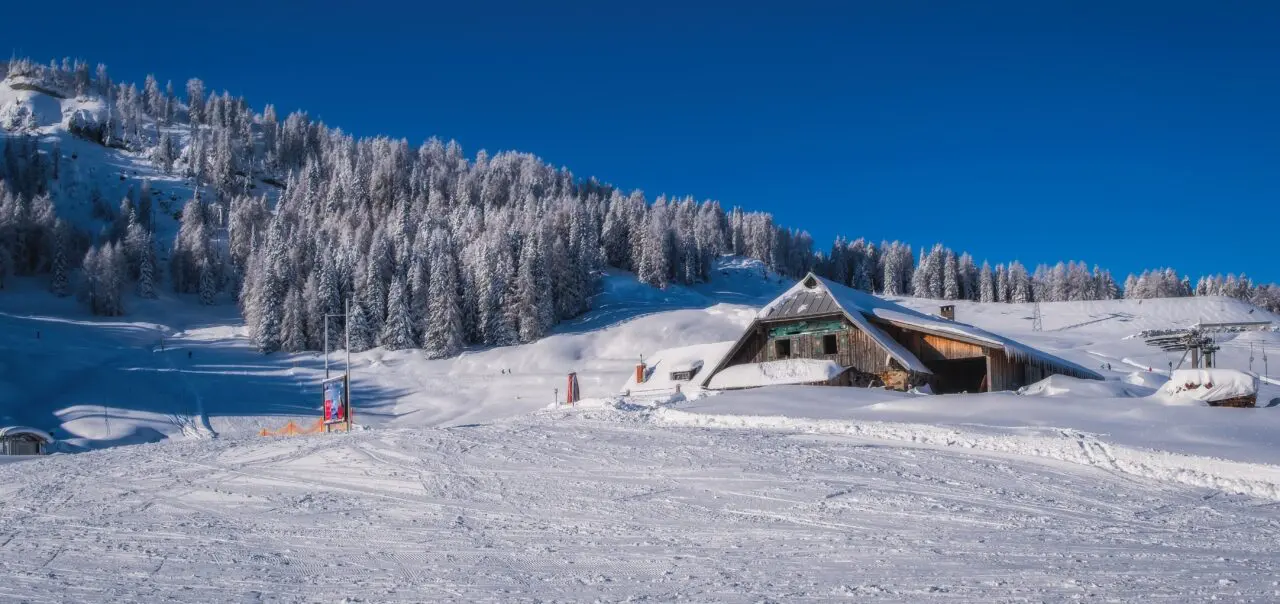 Mountain ski resort Nassfeld in sunny winter day. Carinthia, Austria.