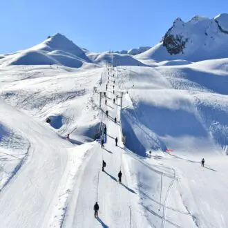 Ski slopes of Courchevel ski resort by winter