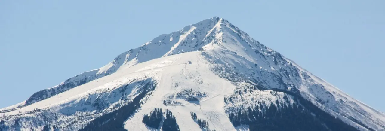 A scenic view of snow-capped Todorka Peak. Bansko, Bulgaria.